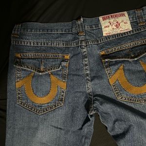 A pair of Vintage True Religion jeans in mint condition